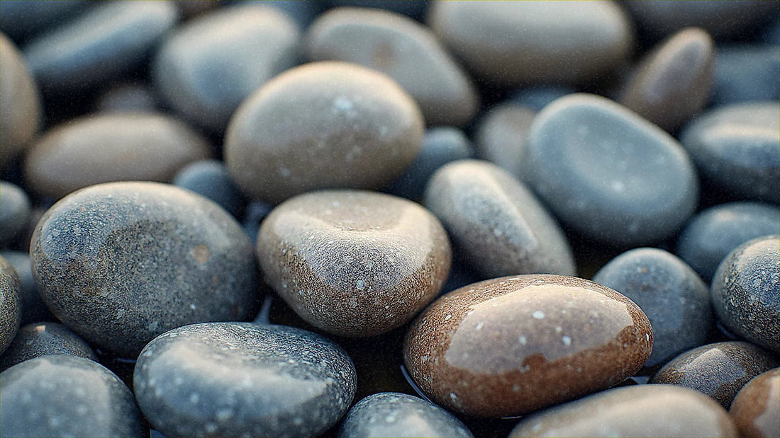 Piedras de río lisas y redondeadas con texturas naturales