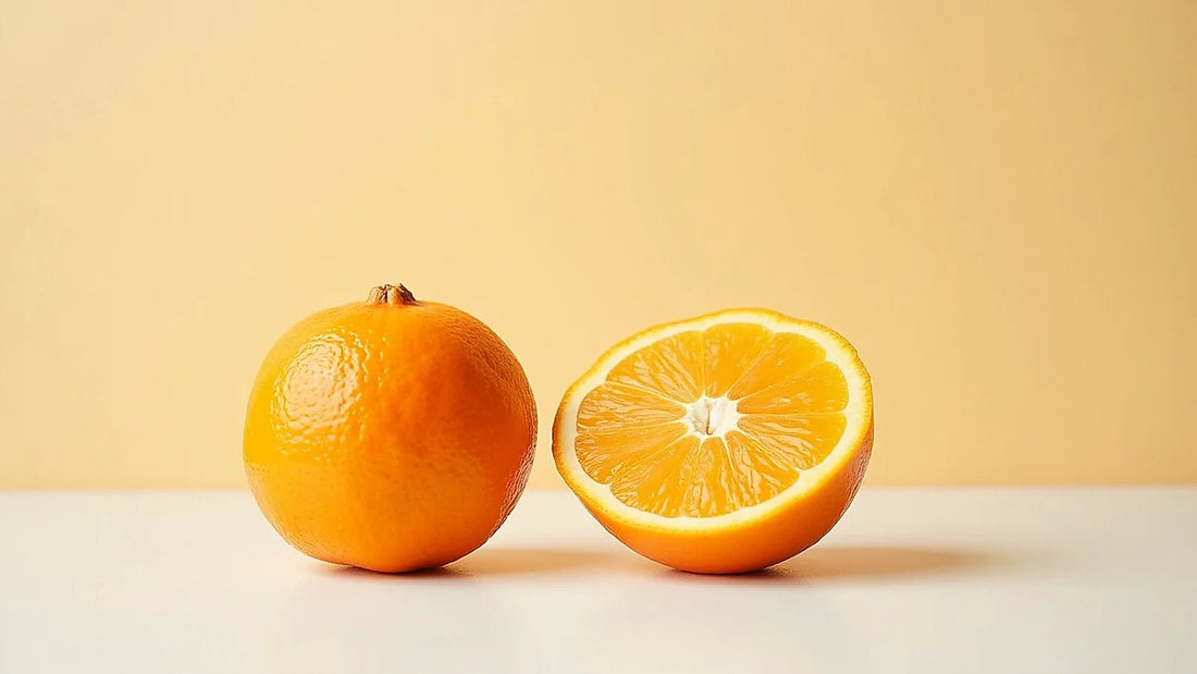 Una naranja entera y otra partida